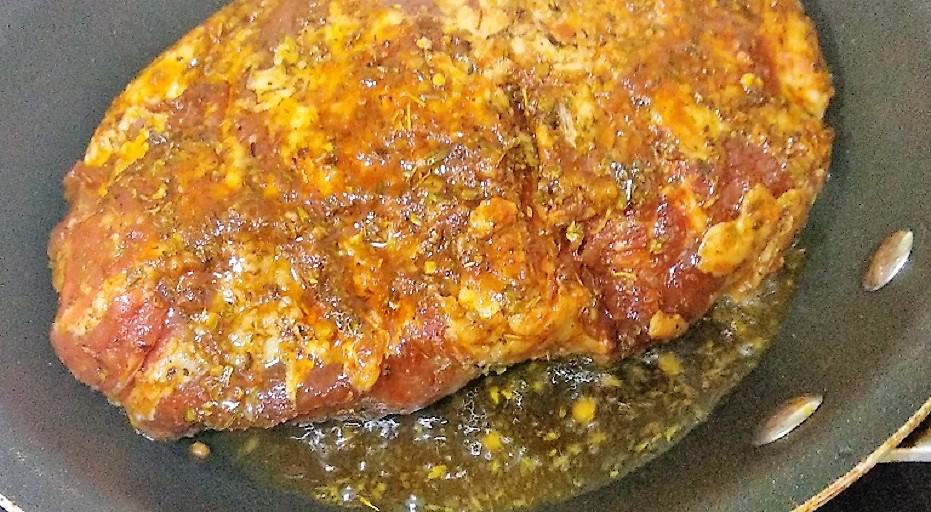lomo en adobo dorandose